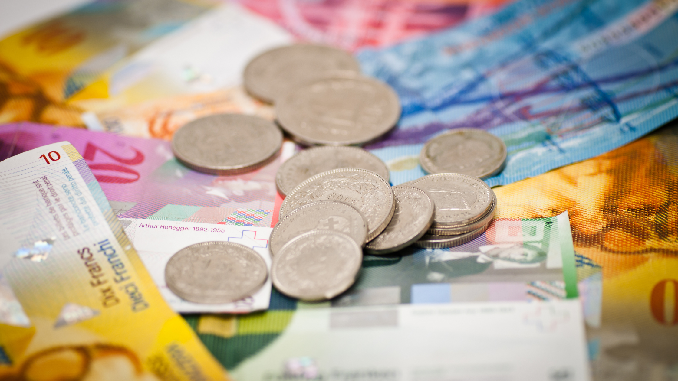 Swiss Franc Loans: Who Bears the Currency Risk? - Piperea & Asociații - firma avocatura